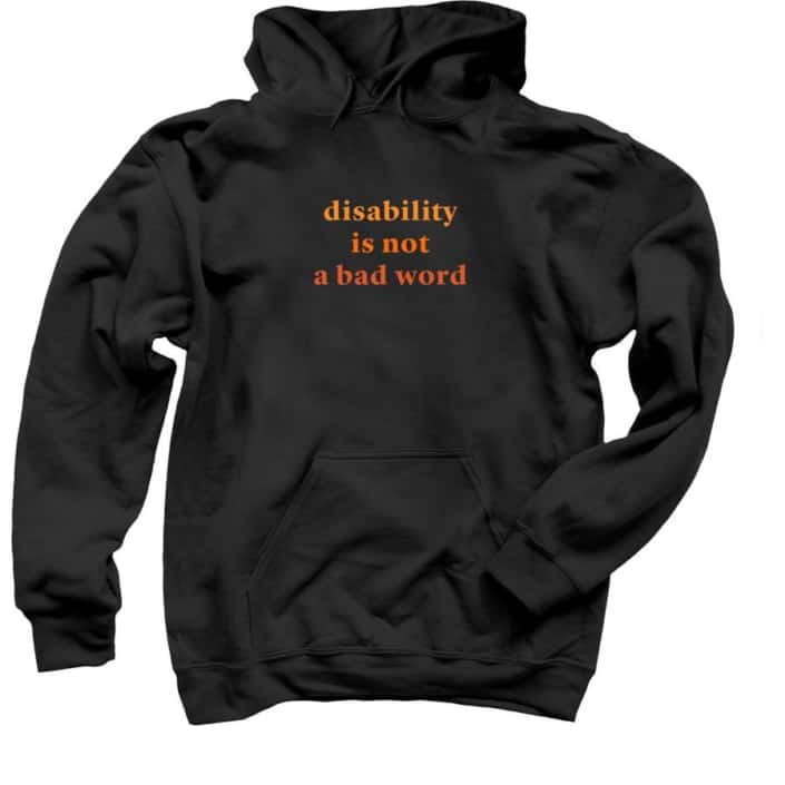 Black sweatshirt with words "disability is not a bad word" in orange text