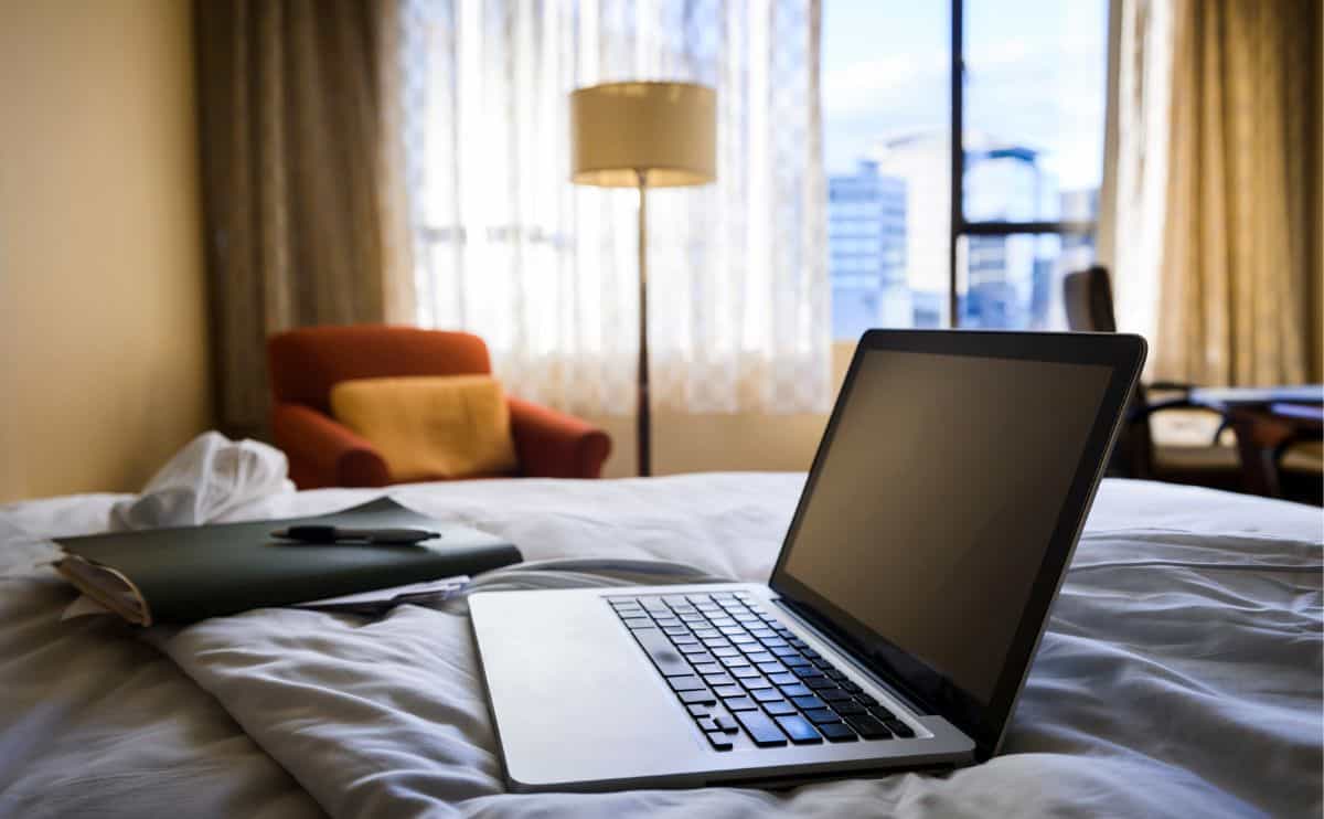 Macbook on a bed